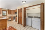 Laundry closet off of the dining-kitchen
