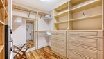 Walk in closet with beautiful built ins