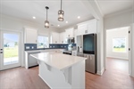 Abundant real wood cabinetry.