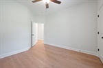 Refreshing lighted ceiling fans in each bedroom.