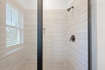Stunning tiled walk in shower.