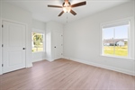 Fourth bedroom with more great windows.