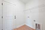 Separate laundry room.