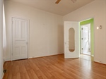 Primary Bedroom Door Leads To Center Hallway 