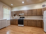 Kitchen Is Illuminated By Recessed Lighting 