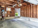 Garage Equipped With Convenient Garage Door Opener