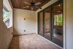 Covered lanai extends game room space