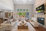 Family room flows to outdoor seating area