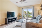 A sliding door leads to the rear balcony.
