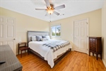 Primary suite with ceiling fan and no carpet!