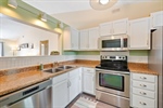 Kitchen with stainless appliances.