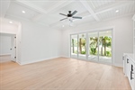 Sliding glass doors lead to the covered patio.