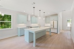 Large island with pendant lighting.