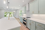 Abundant real wood cabinetry.