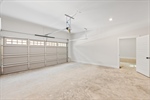 Attached two car garage with opener.