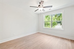 All bedrooms are spacious with walk in closets.