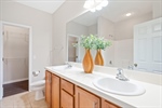Private full bath with double vanity.
