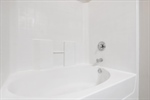 Shower over tub.