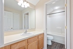 Second full bath with shower over tub.