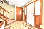 Foyer has coat closet + front dr with sidelights