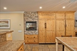 FIREPLACE IN KITCHEN ADDS TO AMBIANCE