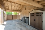 GATED CARPORT IN ADDITION TO 3 CAR GARAGE