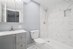 Garden unit primary suite bathroom