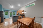 The formal dining room is open to the kitchen.