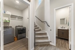 Laundry room and half bath on the 1st floor