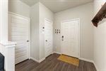 5-panel doors and wood-look vinyl plank flooring