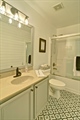 Hall Bath w Trendy Black  White Patterned Floor