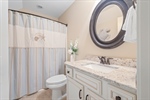 The third full bath is on the upper level.