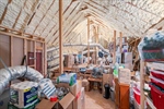 Walk in attic. Storage and spray foam rafters.