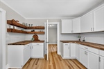 Loads of butcher block counter space.