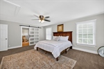 Refreshing lighted ceiling fan and great windows.