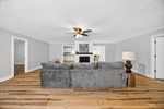 Enter and notice the luxury vinyl plank flooring.