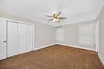 Double closet and a private full bath.