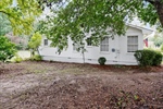 Backyard is ready for a a garden or firepit.