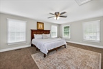 Primary bedroom suite with lots of natural light.