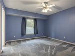 1st Bedroom At Rear With Peaceful Backyard View