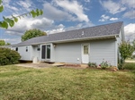 Garage With Added Man Door Opening To Back Yard