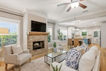 Great room is open to dining and kitchen.