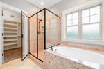 Separate walk-in shower.
