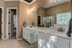 Spa like private bath with quartz vanity.