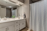 Second full bath with a shower over tub.
