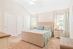 Lighted ceiling fan and double walk in closets.