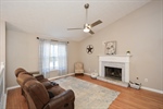 Family Room with Brick Fireplace