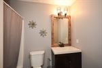 Hall Bath with Updated Vanity  Tile Floors