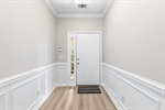 Step inside the foyer with convenient coat closet.
