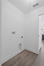 Inside Laundry Room leads to Garage